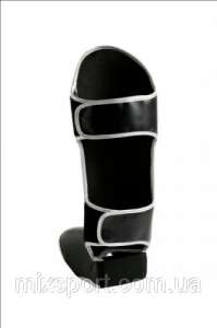     Adidas "Shin Instep Guard" ()