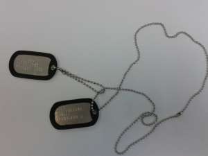    . Dog Tags.  