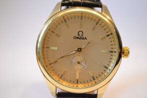     Omega Gold, - 