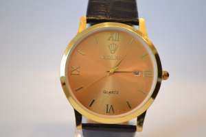     Rolex Quarz (Gold) - 