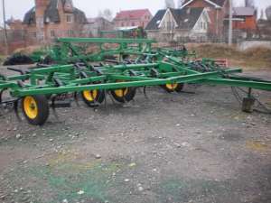   John Deere 1050,  -8,4