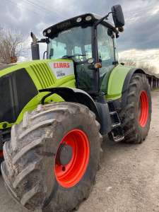  Claas Axion 850 2011 .. 48 500 $.