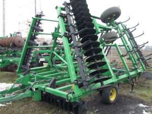 John Deere 724 - 25 000 USD