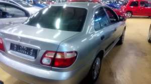 Nissan Almera (1800 . .)