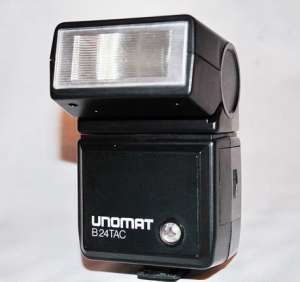 Фотовспышка..Unomat B24 TAC..Thyristor-Computerautomatic новая - объявление